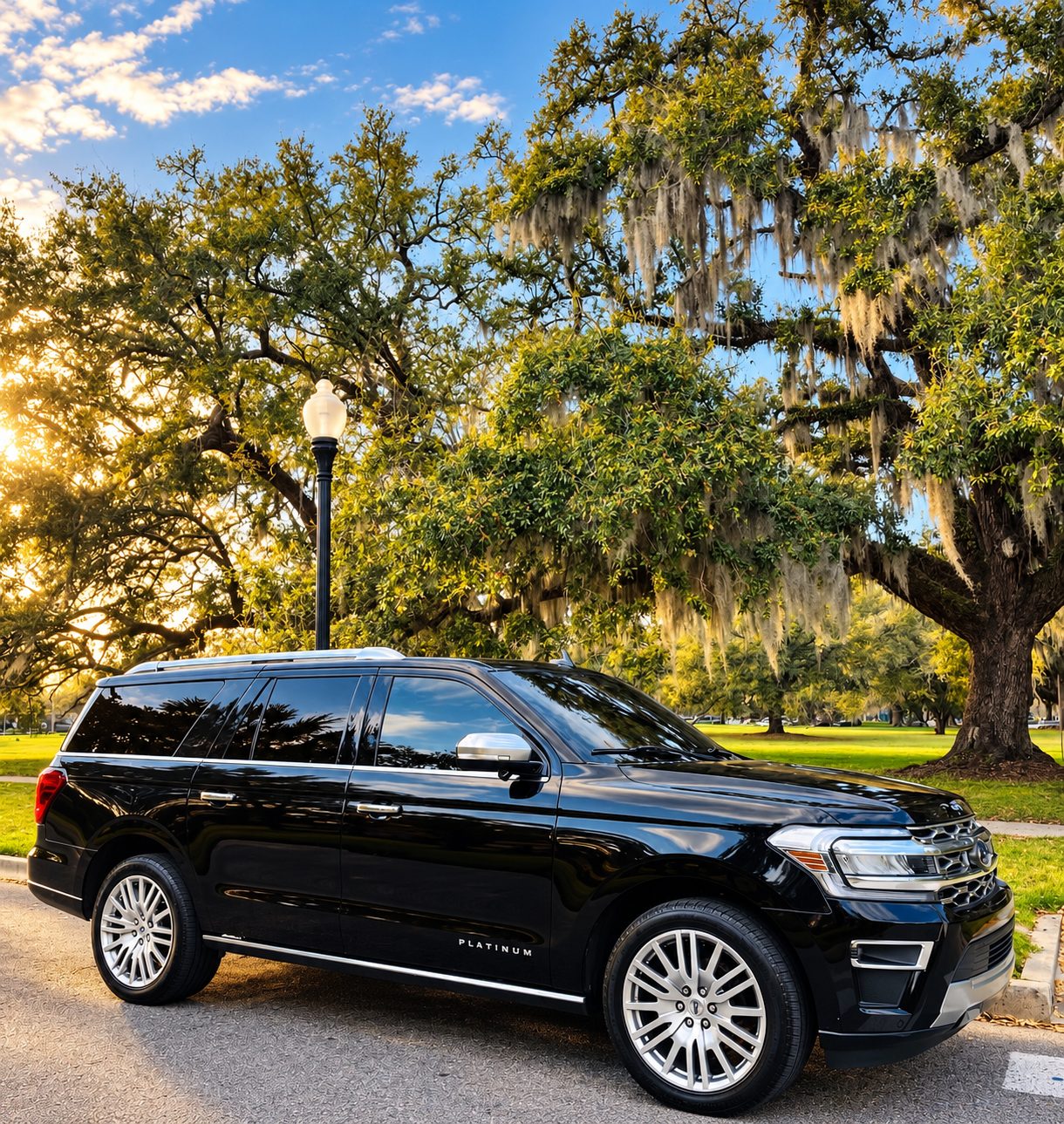 Motorvate black Ford Expedition Platinum under the live oaks in City Park, New Orleans
